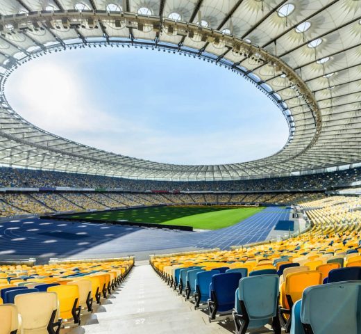 rows-of-yellow-and-blue-stadium-seats-on-soccer-fi-2021-08-29-10-48-54-utc-e1664380704540.jpg